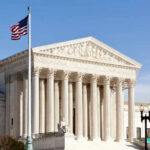 Supreme Court WARNING – 1776 Principles Vanishing Fast… United States Supreme Court building with American flag.