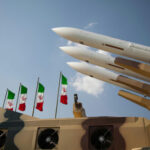 Iranian Smuggling Ring Busted – National Security ALERT… Military missiles displayed with Iranian flags in the background