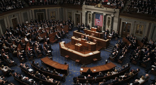 shutterstock_2743607679.jpg A large assembly of politicians in a legislative chamber