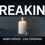 Holy Thursday MASSACRE—43 Christians Killed While Sleeping… A lit candle with a breaking news banner above it
