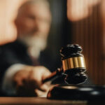 National Guard CRUSHES Soldier’s Free Speech Lawsuit… Judge striking gavel in courtroom.