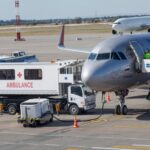 Runway HORROR — Jet Obliterates Airport Intruder… An airplane at an airport with an ambulance and ground crew nearby