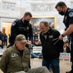 Protesters STORM Capitol Over Racial Gerrymandering Scheme… Veterans being arrested during a protest in the Capitol building