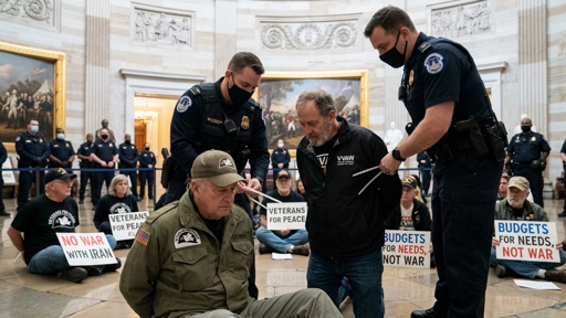 Veterans being arrested during a protest in the Capitol building