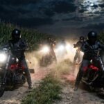 32 Christians Murdered DAILY — Media Goes Silent… Motorcycle riders in a cornfield at night with headlights on