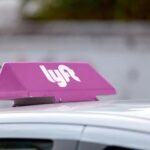 Lyft Driver Guilty In Horrific Attack rideshare car with pink roof sign