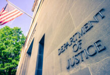Inside America’s Biggest Fraud Takedown Department of Justice building with American flag.