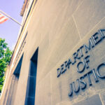 Billion-Dollar Medicaid Shuffle Exposed Department of Justice building with American flag.