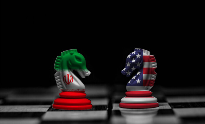 shutterstock2495860501jpg Chess knights with Iran and USA flags facing each other on a board