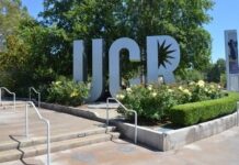 Taxpayer-Funded Aid Sparks New Debate UCR sign sculpture by landscaped flower beds and trees