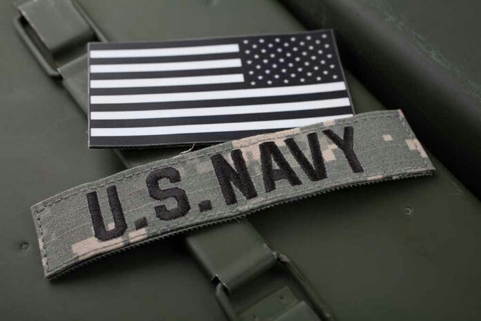 U.S. Navy patch and monochrome American flag patch.