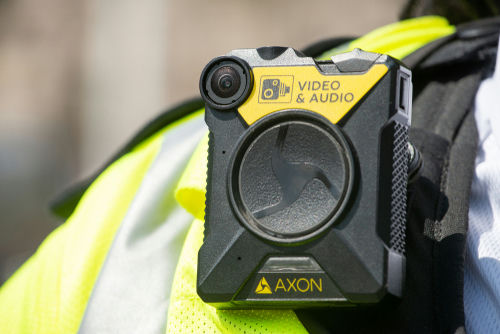 shutterstock1438248011jpg Body-worn camera attached to a high-visibility vest