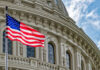 SAVE Act Faces Another Senate Test US flag waving in front of Capitol building.