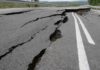 Massive Mexico Quake Sparks Tsunami Alert Asphalt road with deep cracks and collapse
