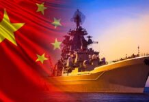 China’s Secret Project Comes Into Focus Chinese warship at sea with national flag overlay