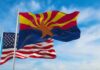 Billions Vanished—Now More Questions Surface Arizona state flag waving with U.S. flags in background