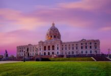 Democrats Gain, GOP Still Favored Minnesota State Capitol building at sunset with a colorful sky