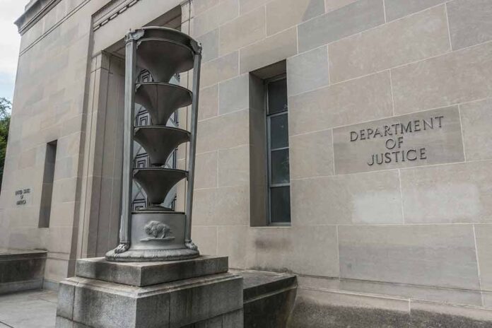 Department of Justice building entrance with statues.