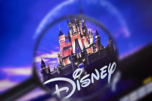 Disney castle logo magnified under a lens.