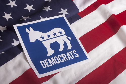 Democratic Party symbol on American flag background.